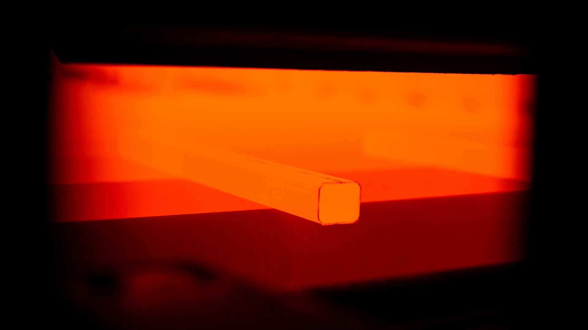 Boron steel tubes being heated during ACCRA process